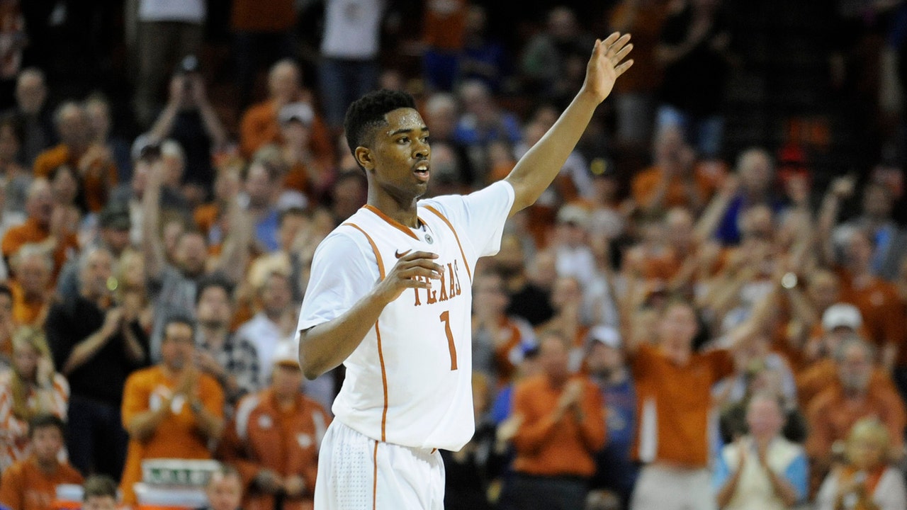 Holmes powers No. 25 Texas over No. 6 Kansas 81-69